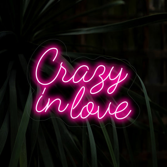 "Crazy In Love Neon Sign" – A passionate and romantic neon light displaying the words "Crazy In Love," infusing your space with fiery energy and heartfelt emotion.