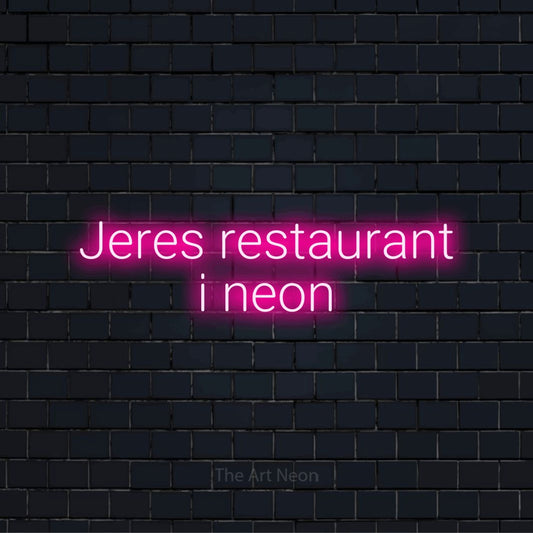 Personligt neonskilt med teksten “Jeres restaurant i neon” på en sort murstensvæg