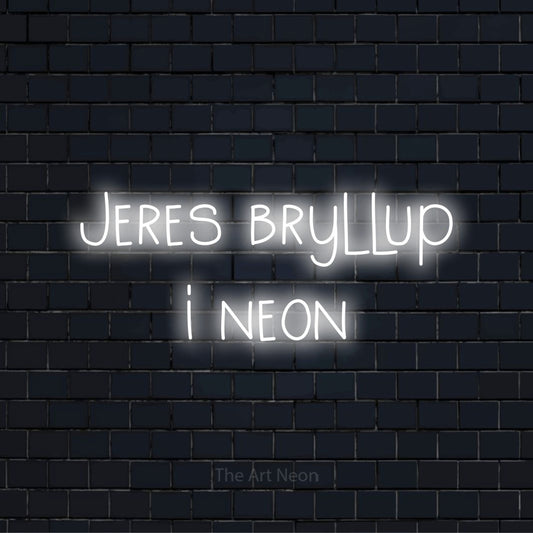 Personligt neonskilt med teksten “Jeres bryllup i neon” på en sort murstensvæg