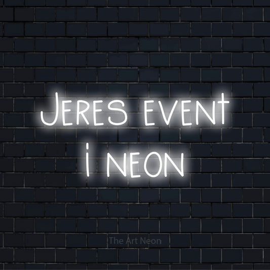 Personligt neonskilt med teksten “Jeres event i neon” på en sort murstensvæg
