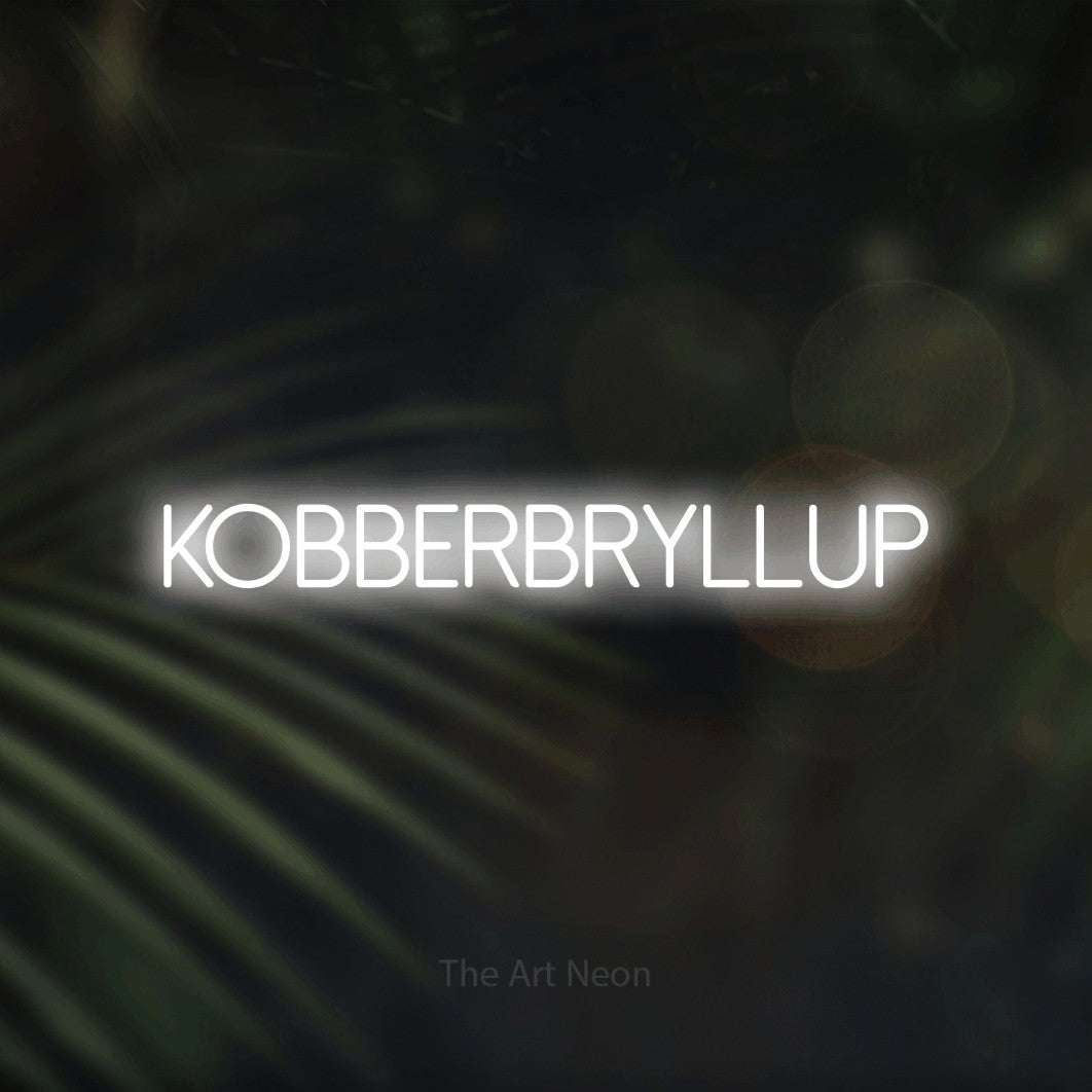 LED neon sign reading “KOBBERBRYLLUP”, arranged in a single line.