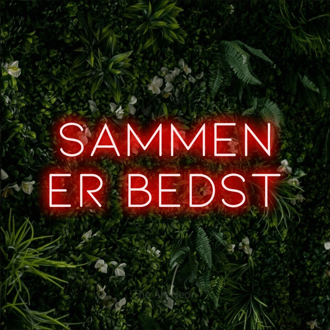 LED neon sign reading “Sammen er Bedst”, arranged in 2 lines.
