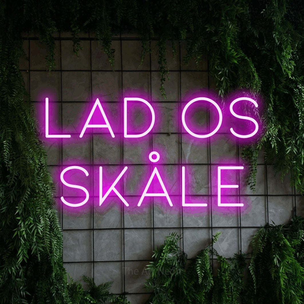 LED neon sign reading “Lad os skåle”, arranged in 2 lines.