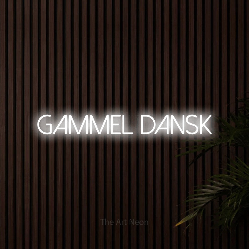 LED neon sign reading “Gammel Dansk”, arranged in a single line.