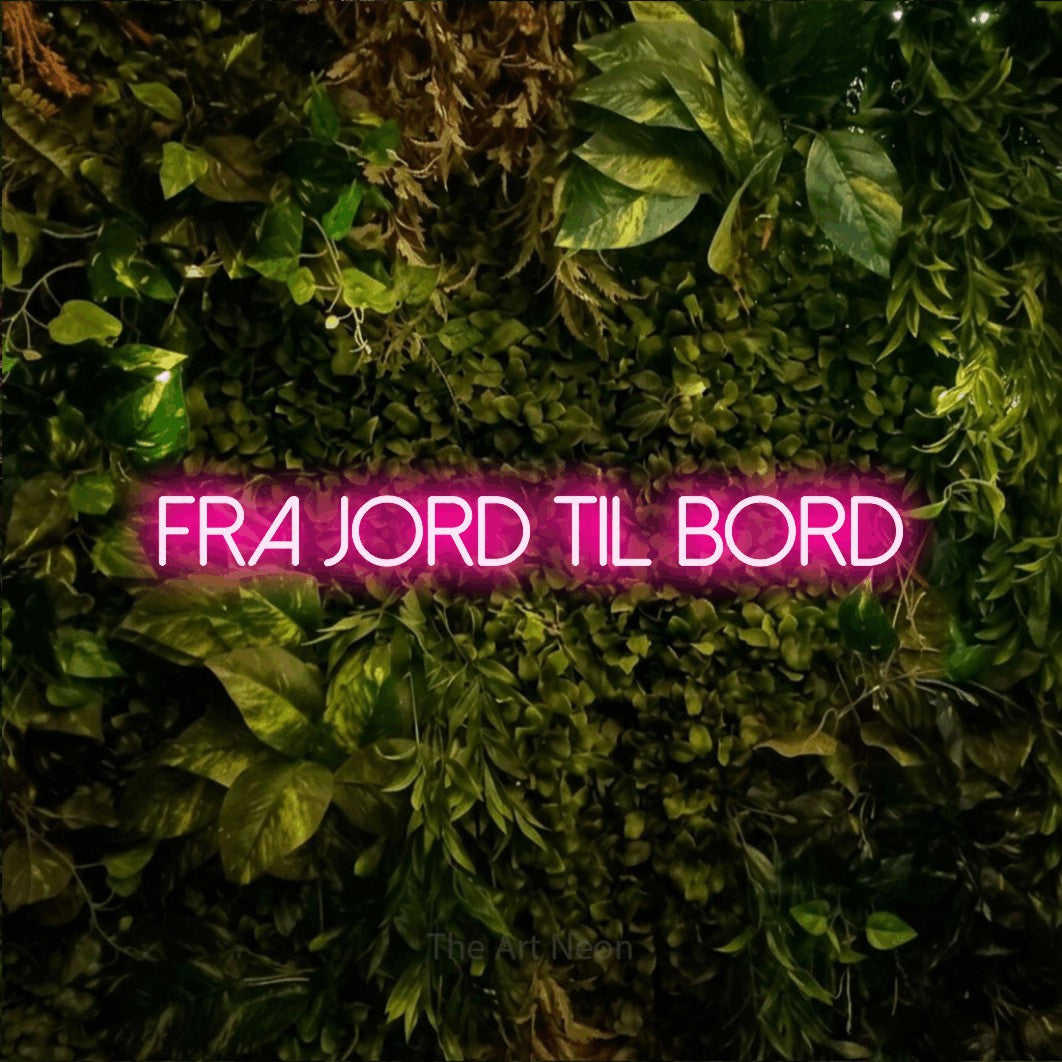 LED neon sign reading “FRA JORD TIL BORD”, arranged in a single line.