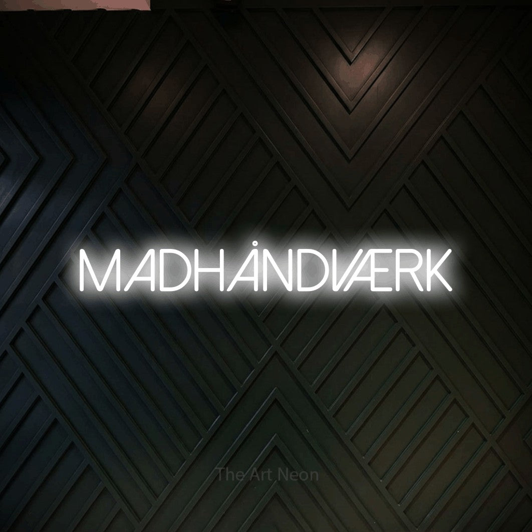 LED neon sign reading “MADHÅNDVÆRK”, arranged in a single line.