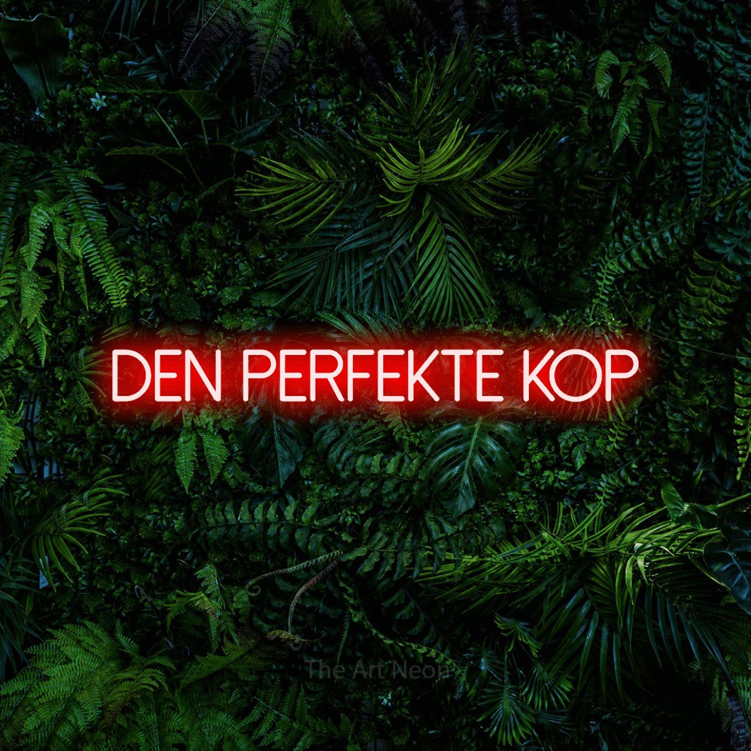 LED neon sign reading “den perfekte kop”, arranged in a single line.