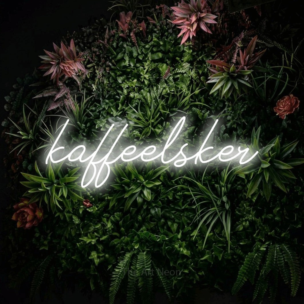 LED neon sign reading “kaffeelsker”, arranged in a single line.