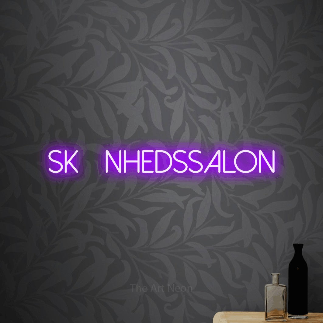 LED neon sign reading “SKØNHEDSSALON”, arranged in a single line.