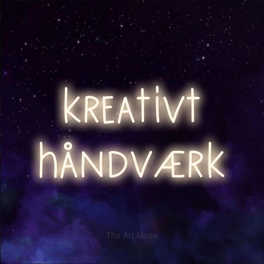 LED neon sign reading “kreativt håndværk”, arranged in 2 lines.