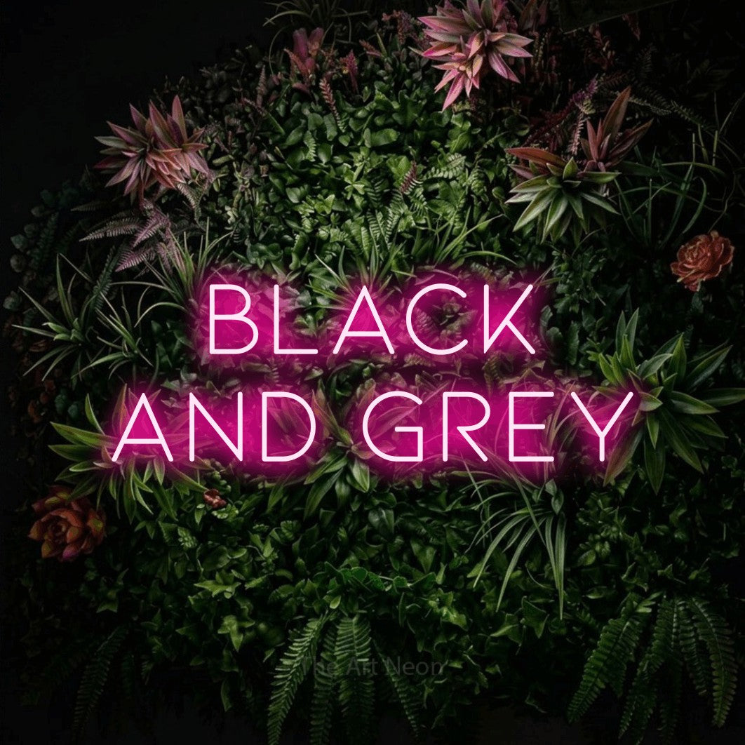 LED neon sign reading “Black And Grey”, arranged in 2 lines.
