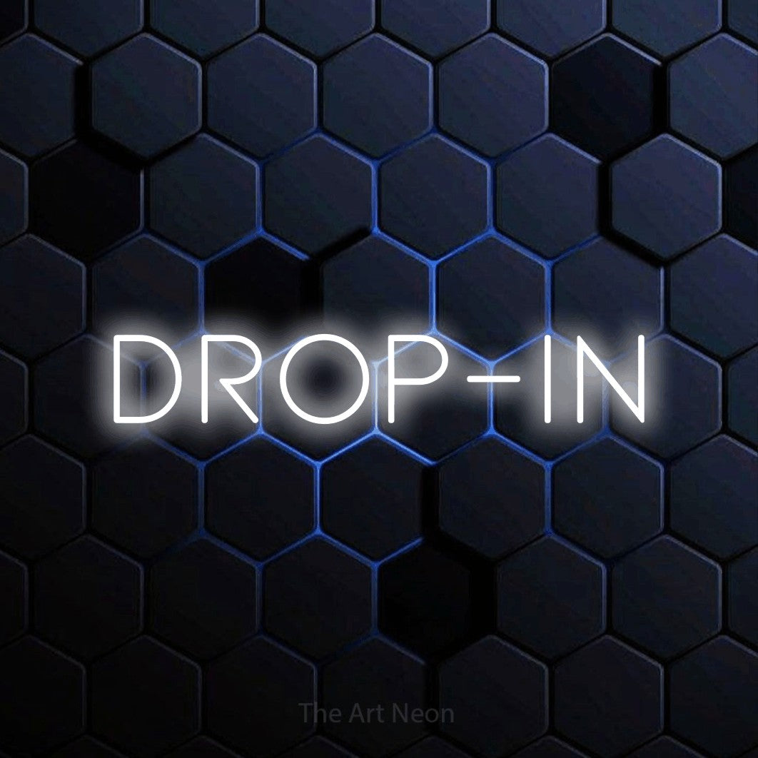 LED neon sign reading “drop-in”, arranged in a single line.