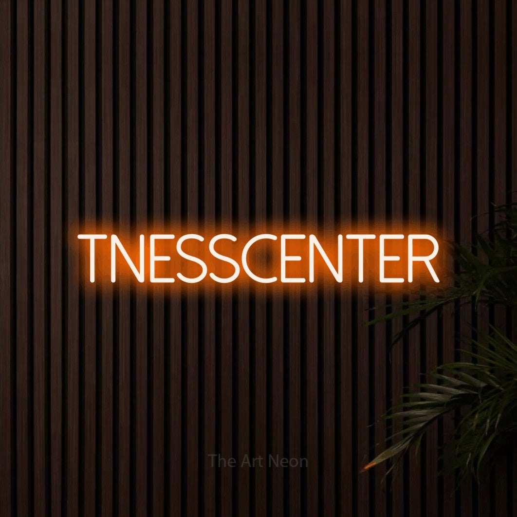 LED neon sign reading “fitnesscenter”, arranged in a single line.