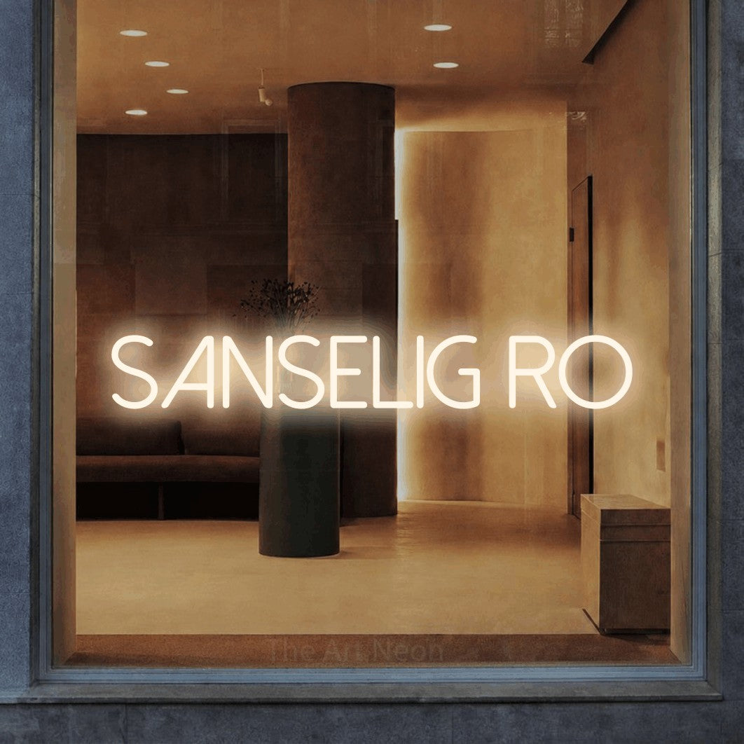 LED neon sign reading “SANSELIG RO”, arranged in a single line.