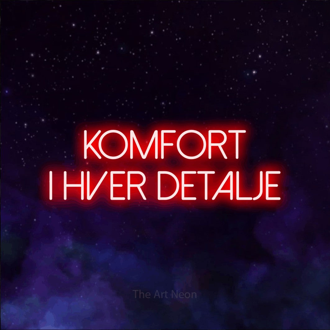 LED neon sign reading “komfort i hver detalje”, arranged in 2 lines.