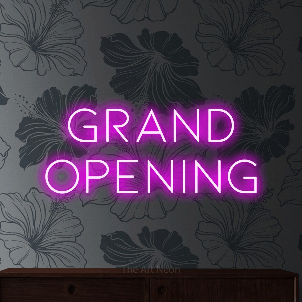 LED neon sign reading “Grand opening”, arranged in 2 lines.
