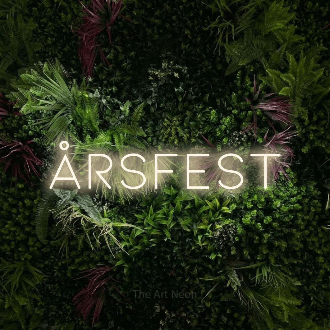 LED neon sign reading “Årsfest”, arranged in a single line.