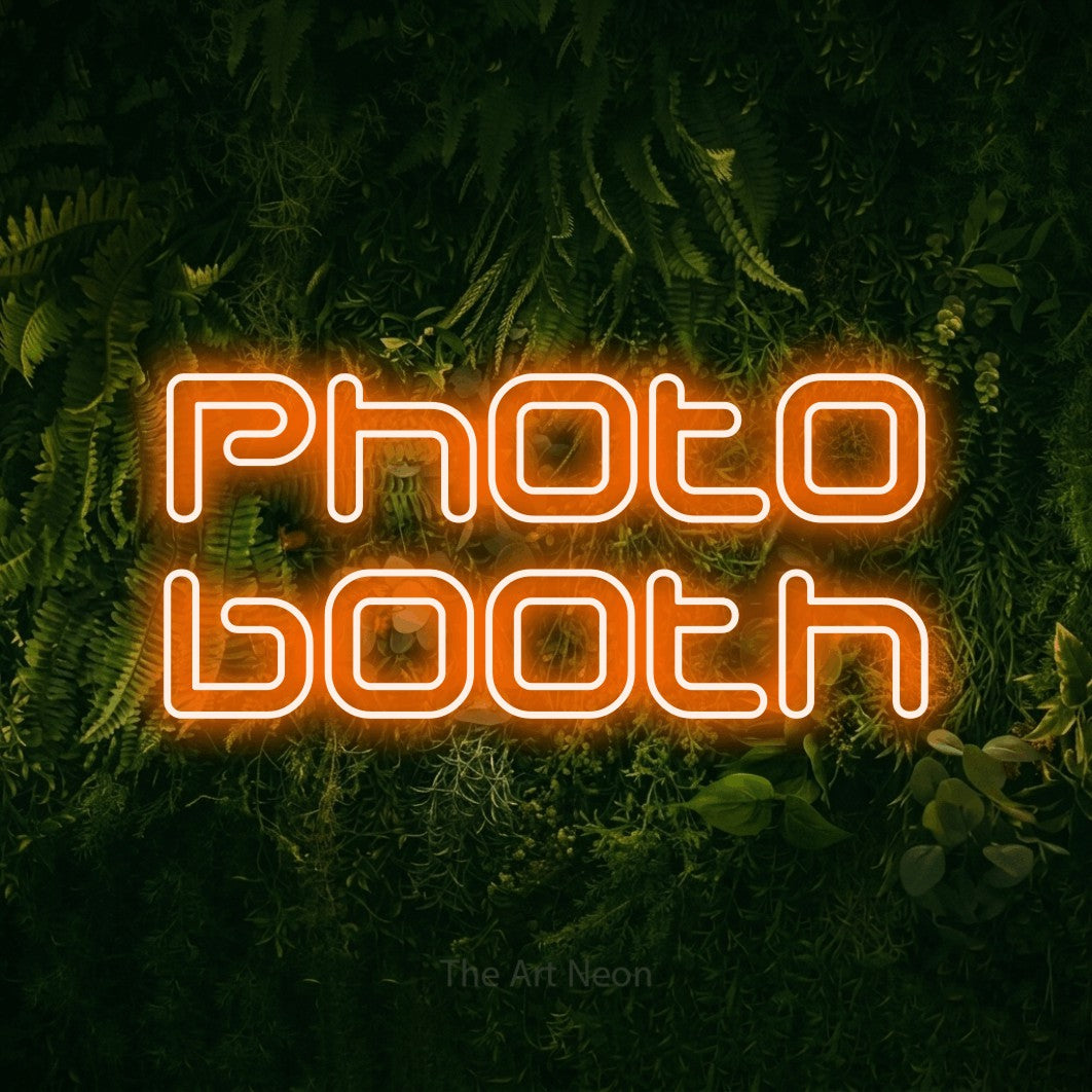 LED neon sign reading “photo booth”, arranged in 2 lines.