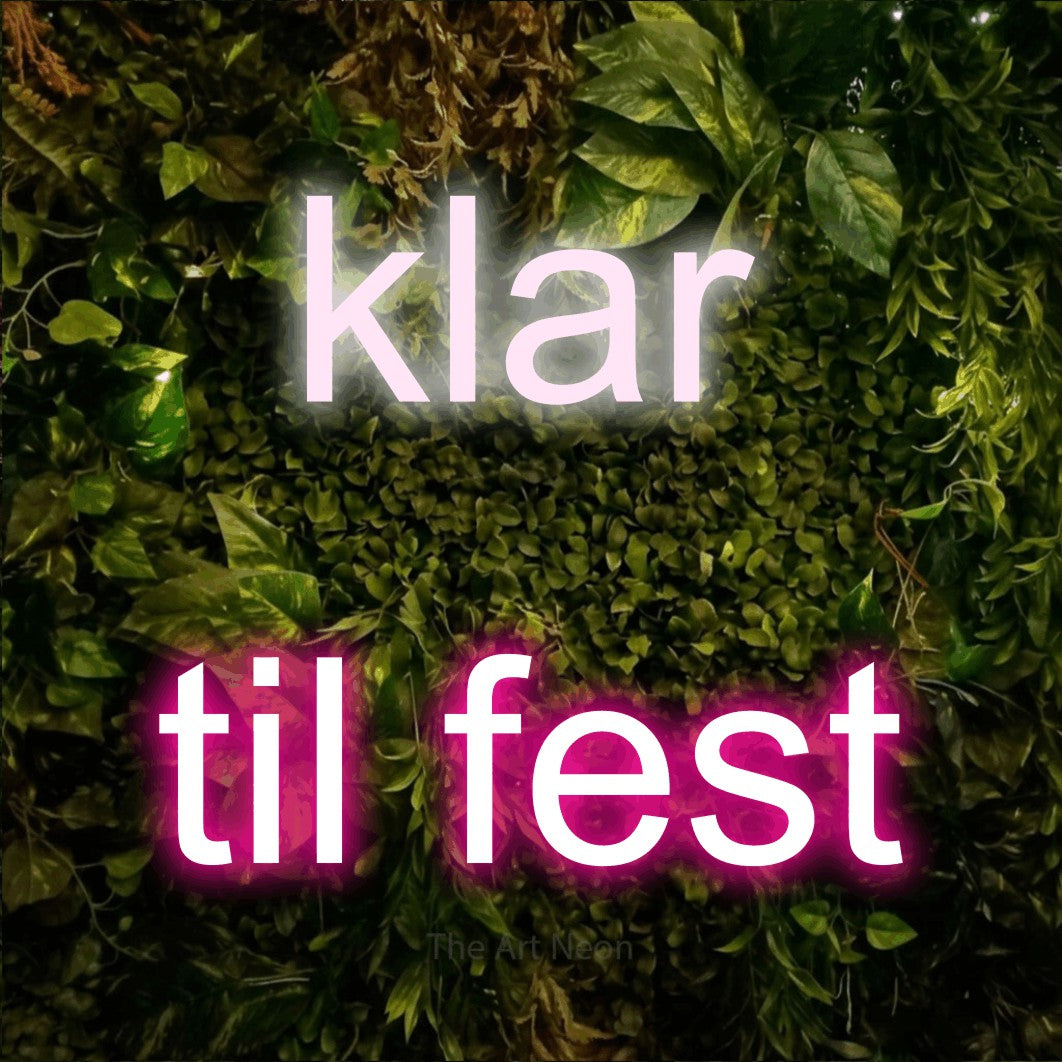 LED neon sign reading “klar til fest”, arranged in 2 lines.