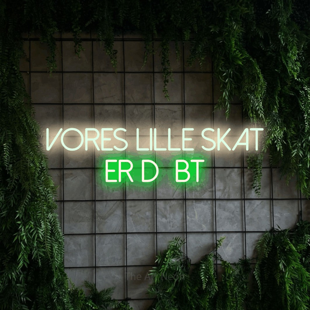 LED neon sign reading “vores lille skat er døbt”, arranged in 2 lines.