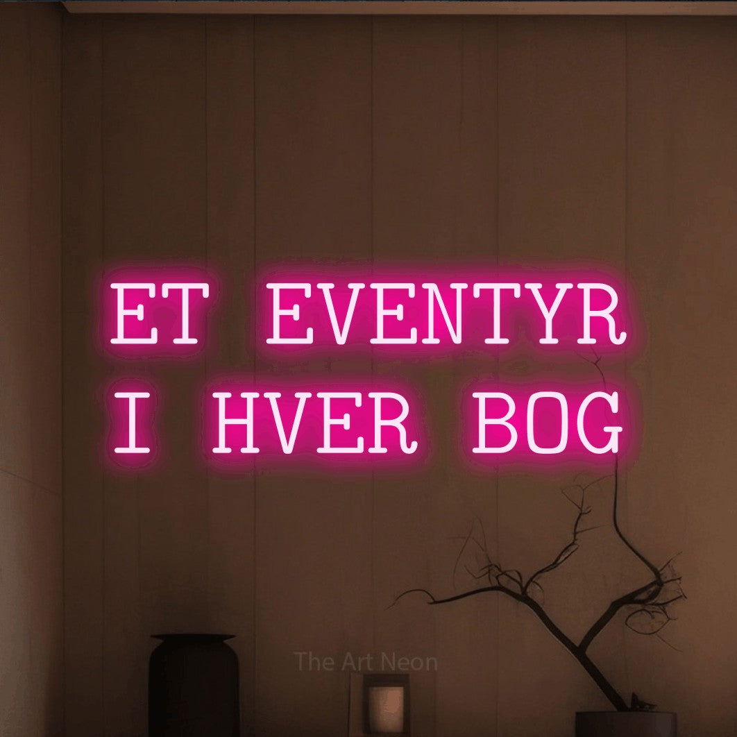 LED neon sign reading “ET EVENTYR I HVER BOG”, arranged in 2 lines.