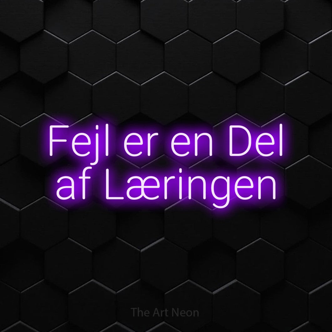 LED neon sign reading “Fejl er en Del af Læringen”, arranged in 2 lines.
