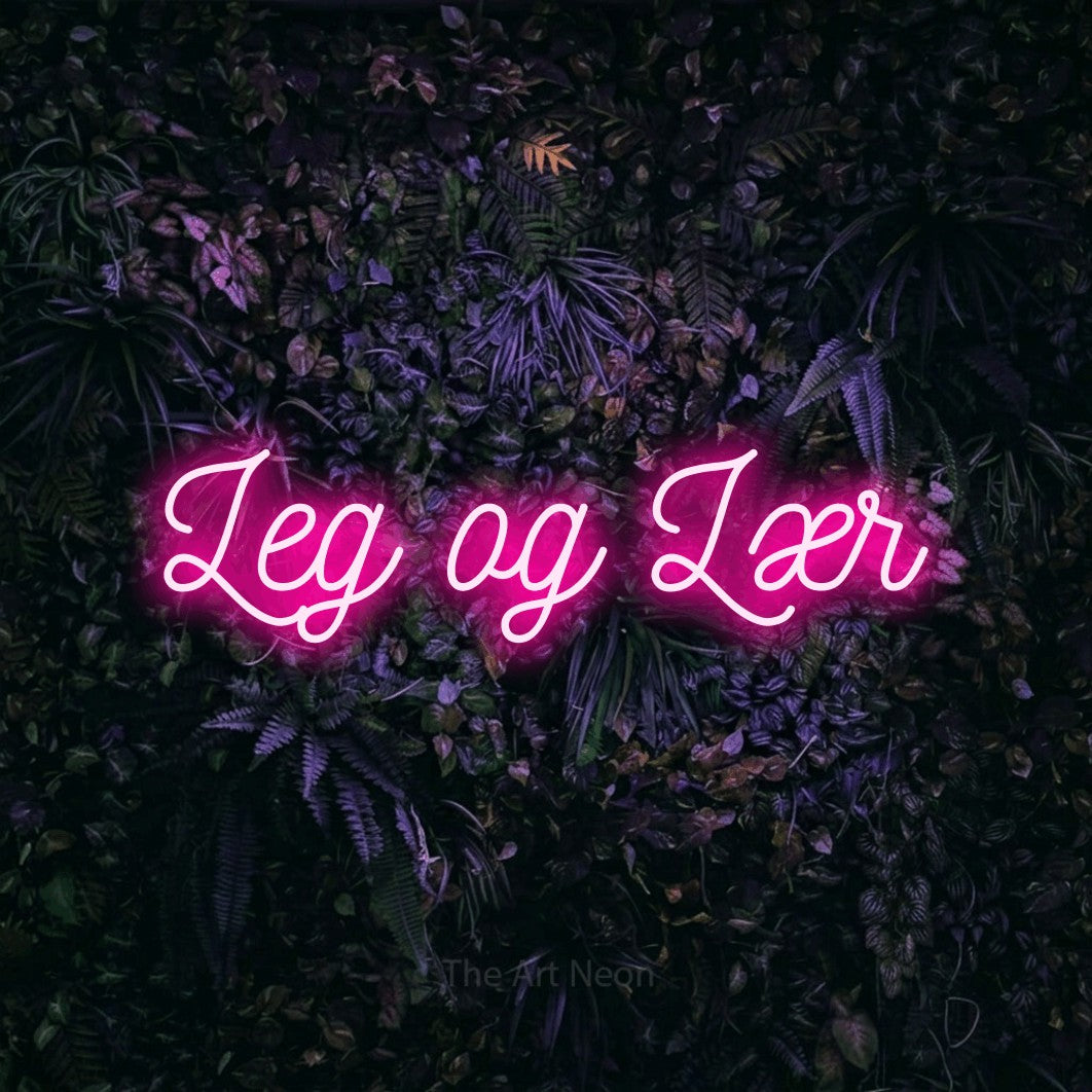 LED neon sign reading “Leg og Lær”, arranged in a single line.
