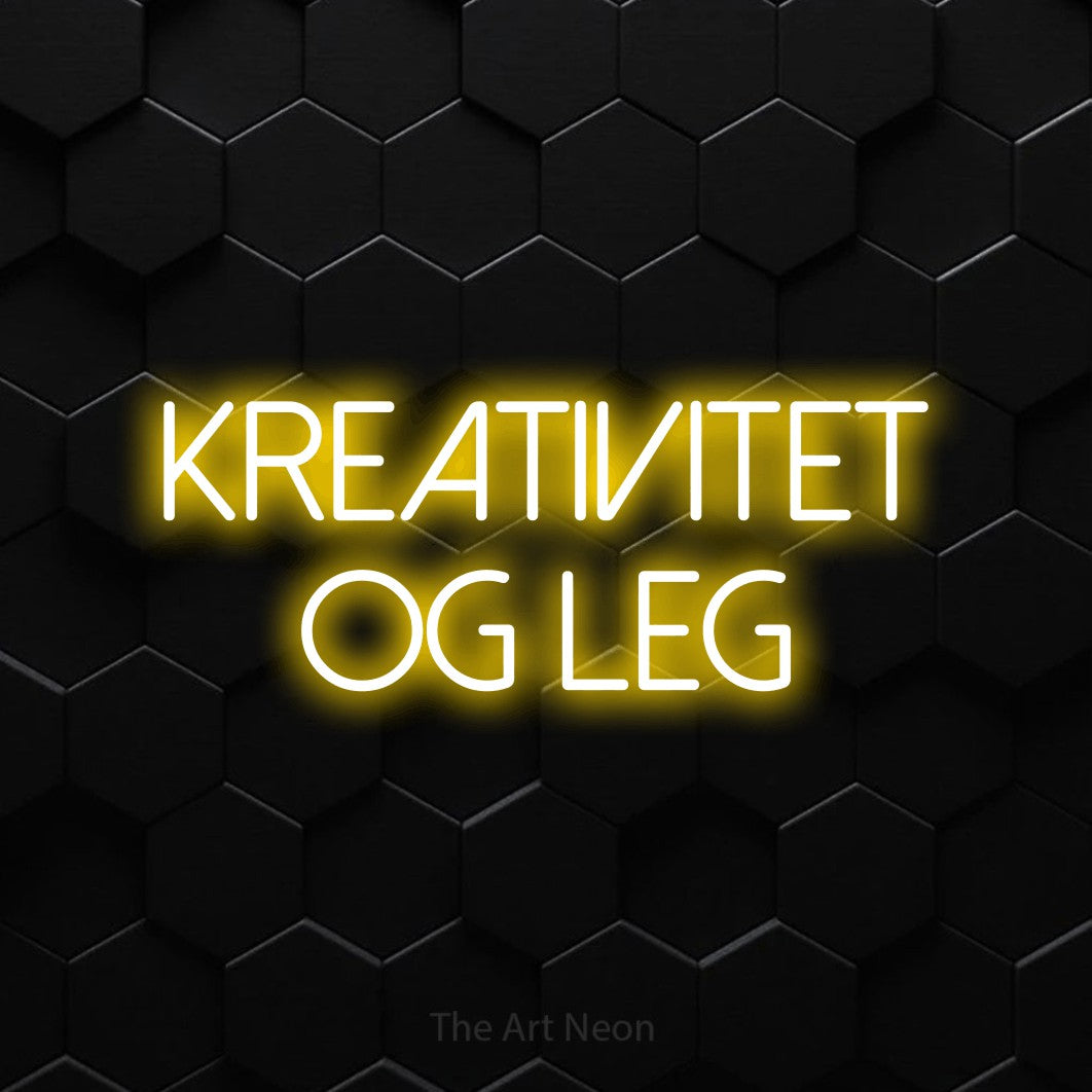 LED neon sign reading “KREATIVITET og leg”, arranged in 2 lines.