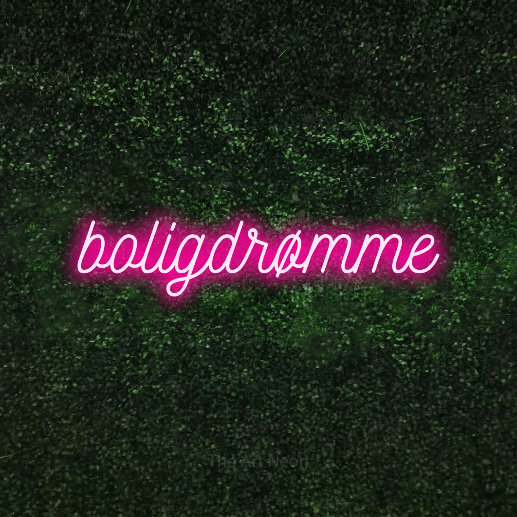 LED neon sign reading “boligdrømme”, arranged in a single line.
