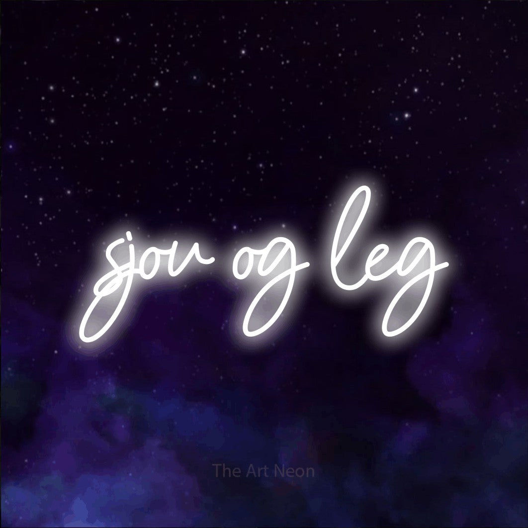 LED neon sign reading “sjov og leg”, arranged in a single line.