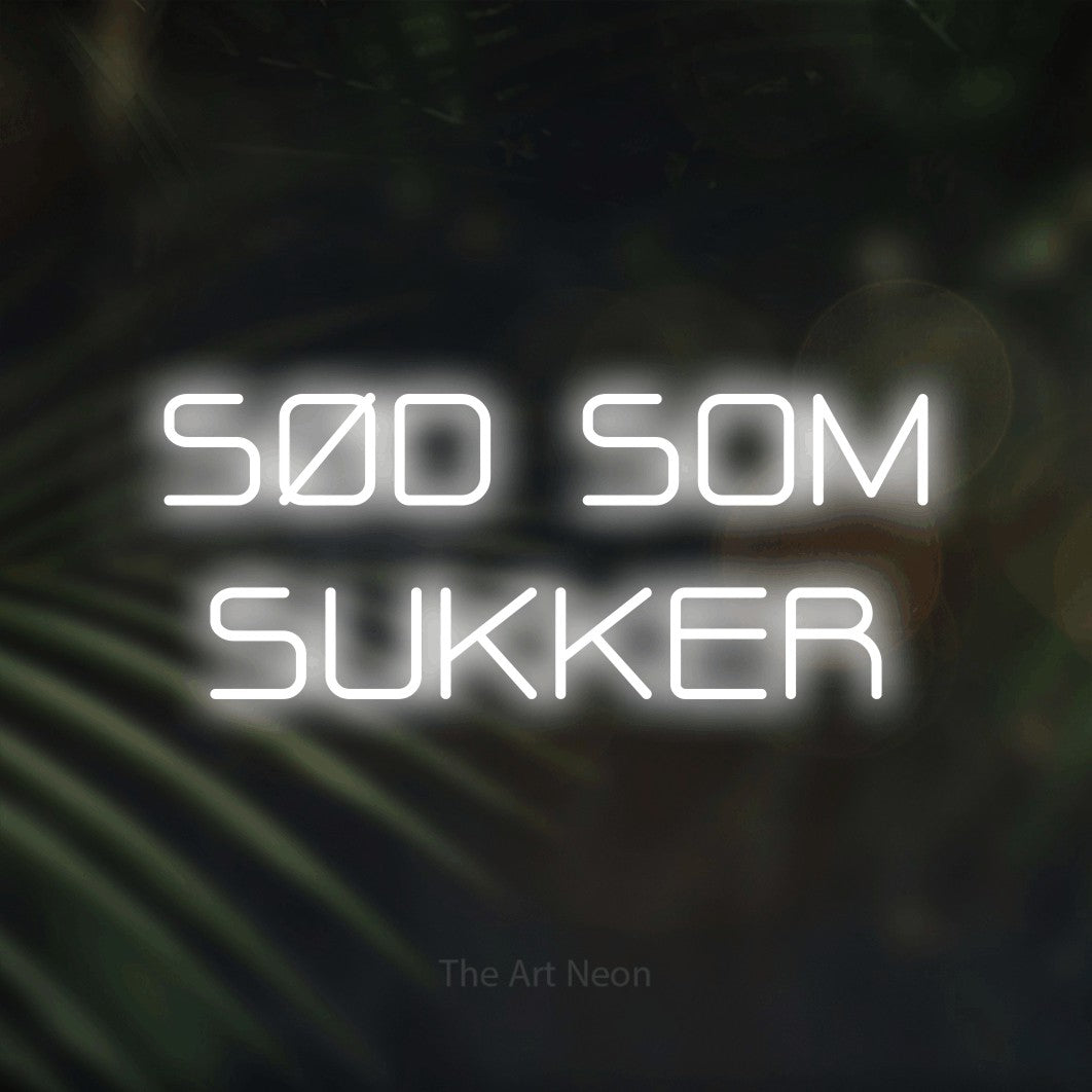 LED neon sign reading “SØD SOM SUKKER”, arranged in 2 lines.