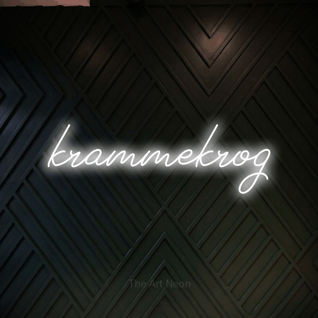 LED neon sign reading “krammekrog”, arranged in a single line.