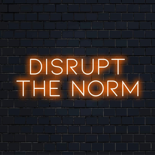 Custom LED neon sign featuring Disrupt The Norm in vibrant lights; a blend of modern art and eye-catching decor.
