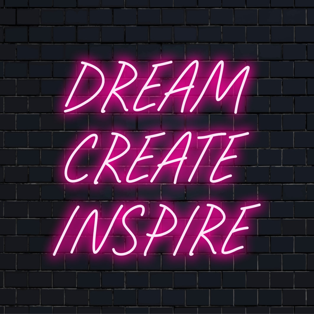 Custom LED neon sign with Dream, Create, Inspire in vibrant glow. Perfect for unique decor and positive energy addition.