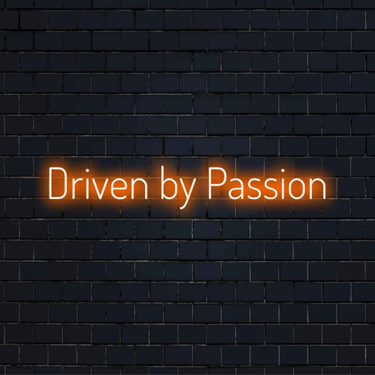 Handmade custom LED Neon Sign titled Driven By Passion, perfect for vibrant interiors, adding unique neon charm to any space.