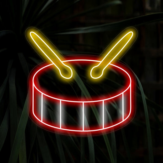 "Drum With Sticks Neon Sign" pulses with a rhythmic glow, ideal for music studios and spaces dedicated to the art of drumming.