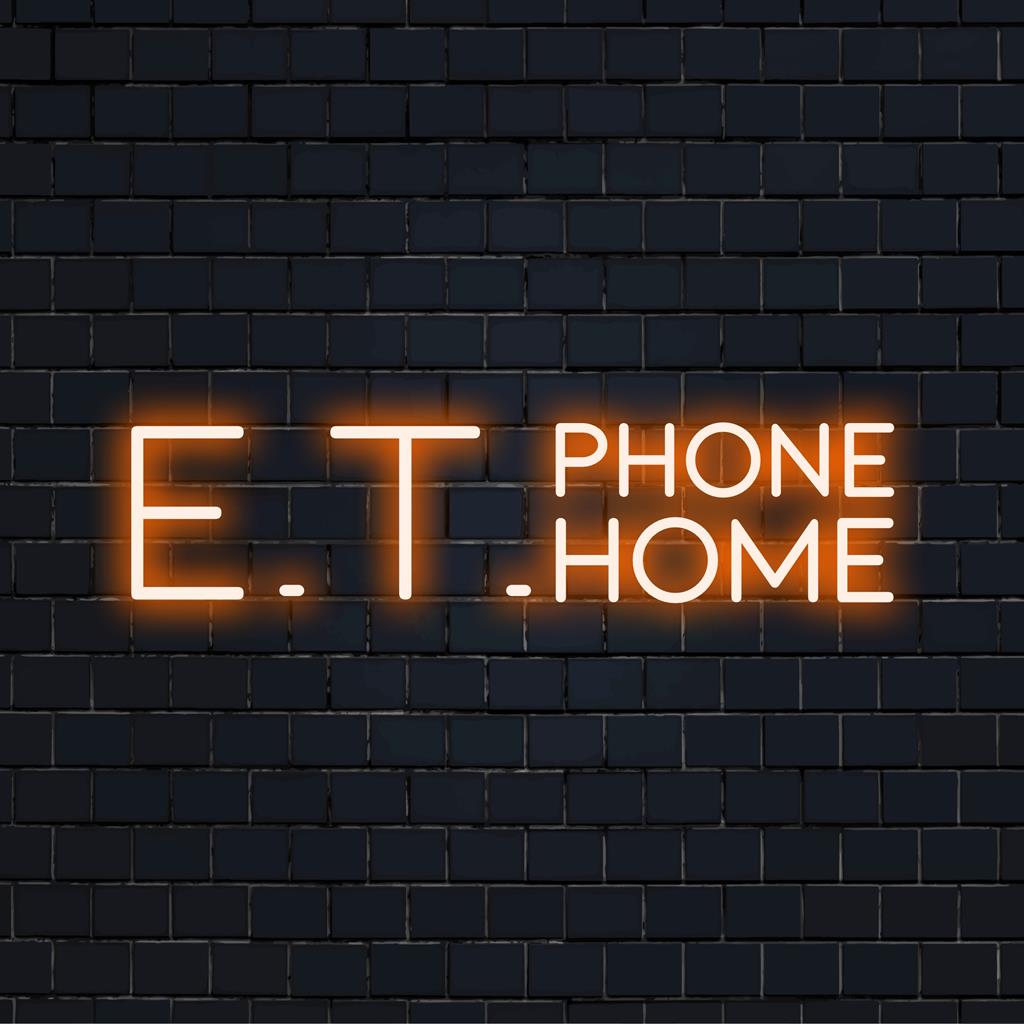 Custom LED neon sign displaying E.T. Phone Home in vibrant light, blending retro charm with modern neon decor.