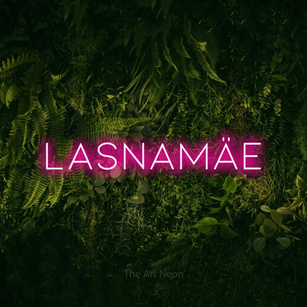 LED neon sign reading “LASNAMÄE”, arranged in a single line.