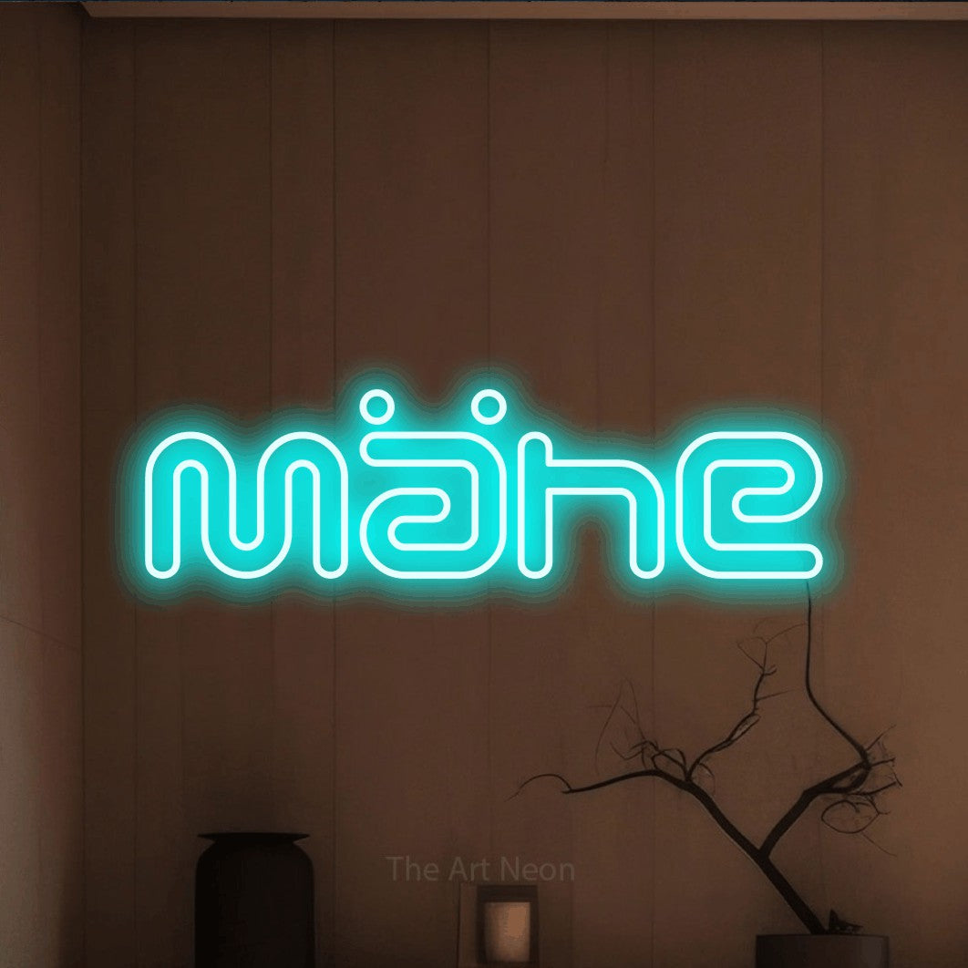 LED neon sign reading “Mähe”, arranged in a single line.