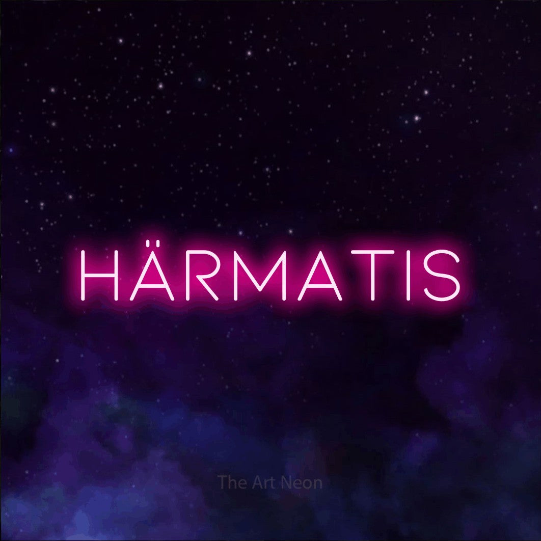 LED neon sign reading “HÄRMATIS”, arranged in a single line.