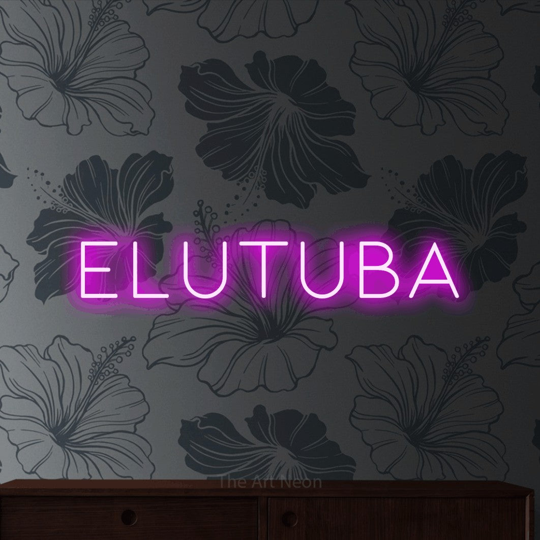 LED neon sign reading “ELUTUBA”, arranged in a single line.