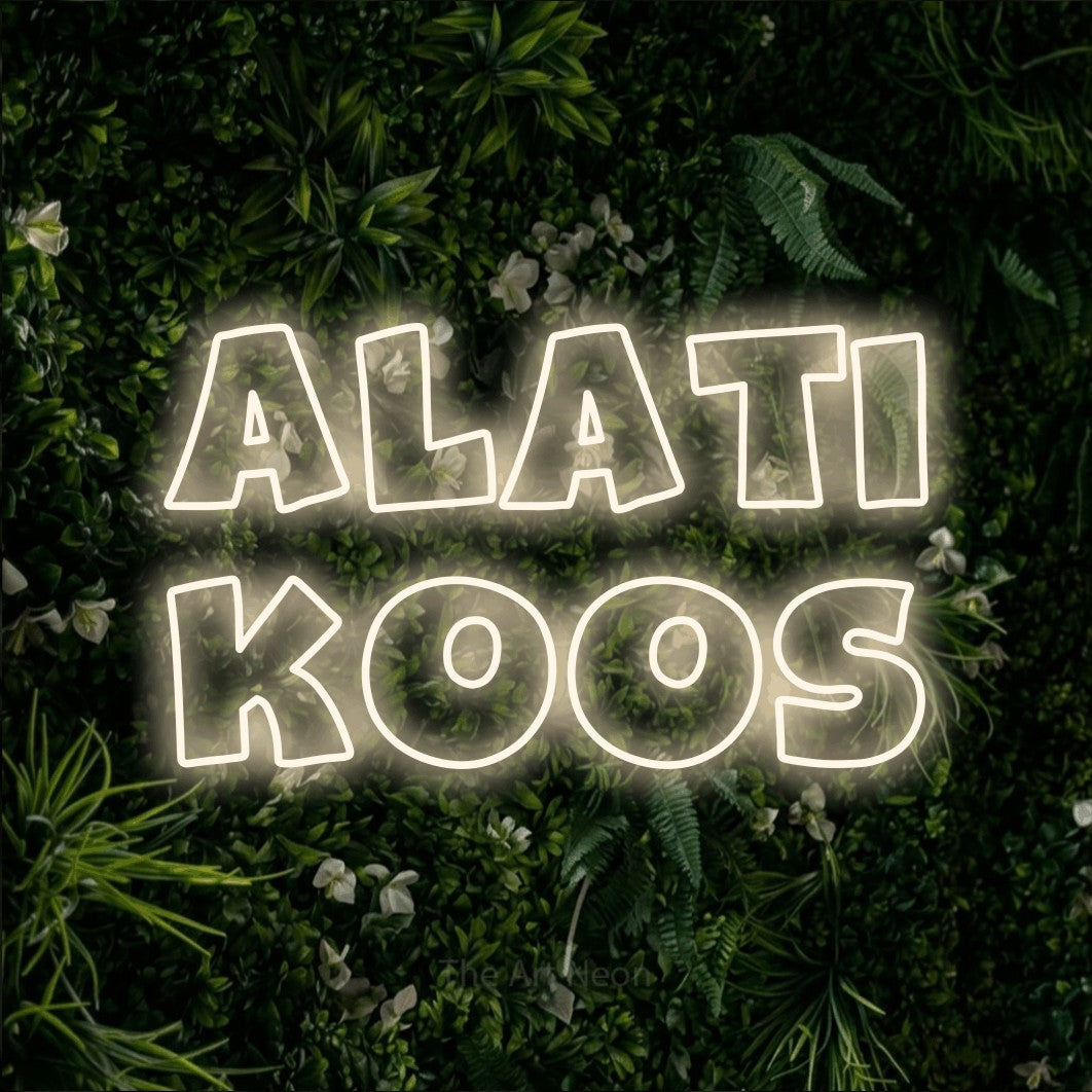 LED neon sign reading “ALATI KOOS”, arranged in 2 lines.