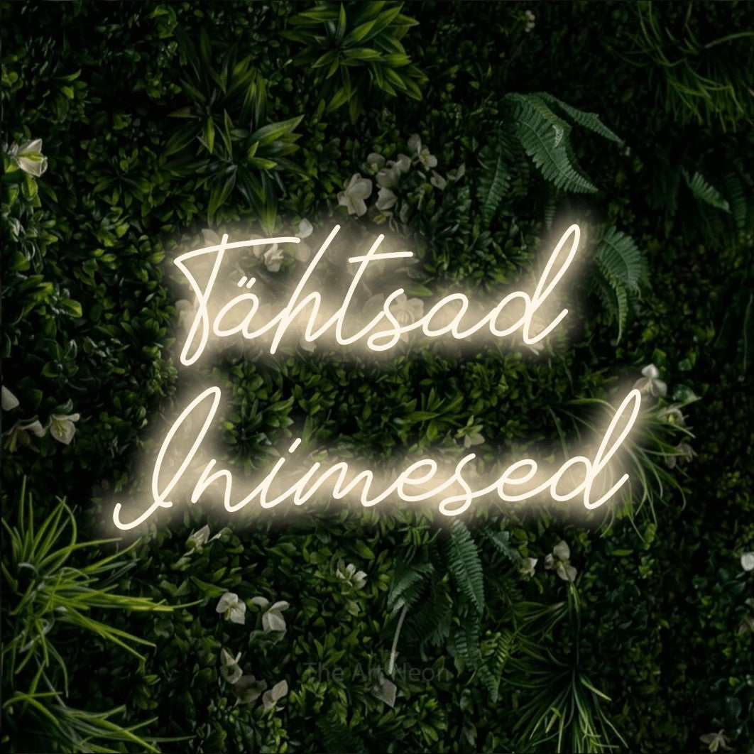 LED neon sign reading “Tähtsad Inimesed”, arranged in 2 lines.
