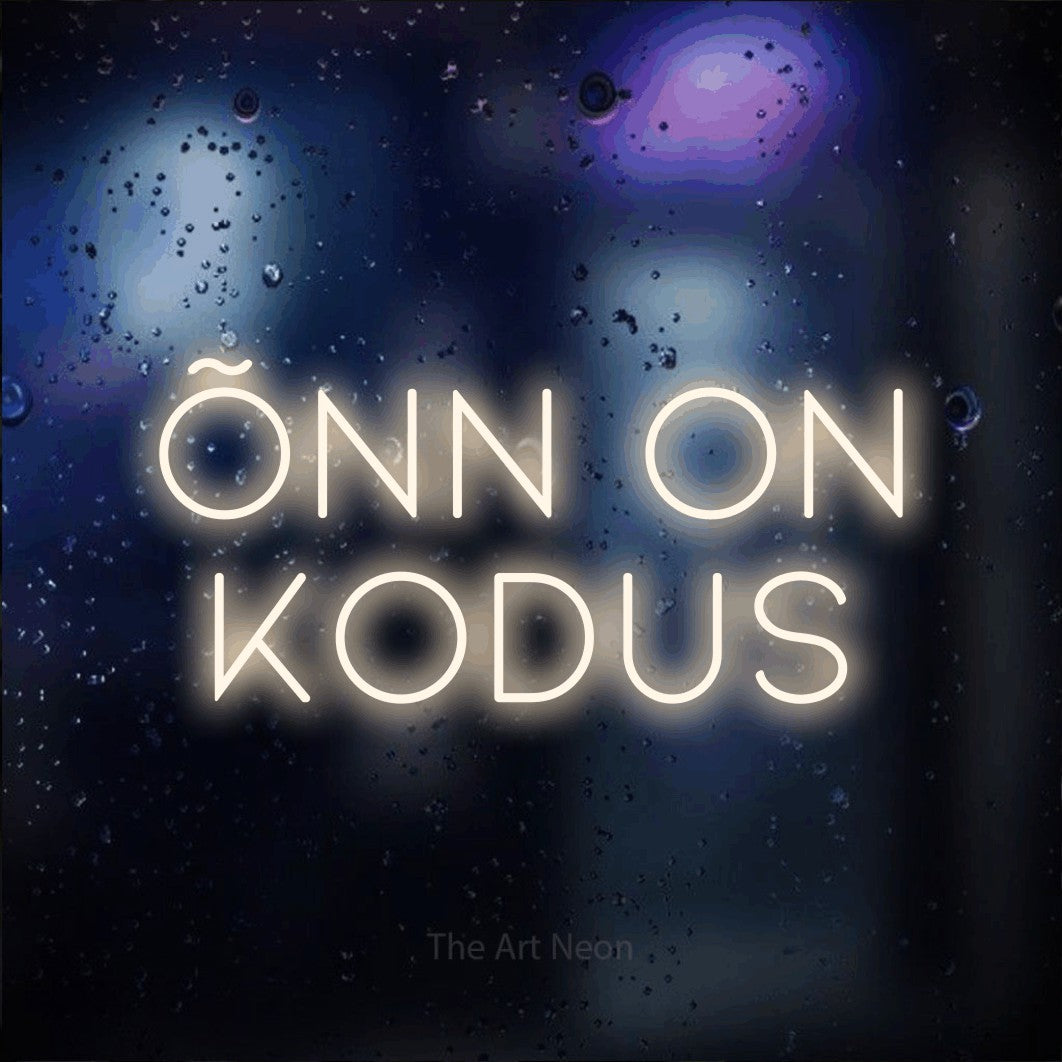 LED neon sign reading “Õnn On Kodus”, arranged in 2 lines.