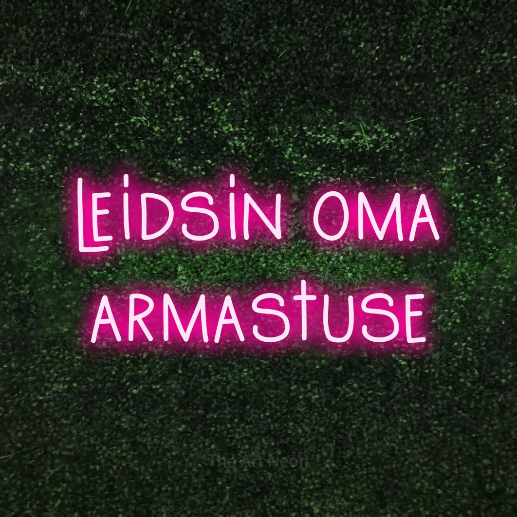 LED neon sign reading “leidsin oma armastuse”, arranged in 2 lines.