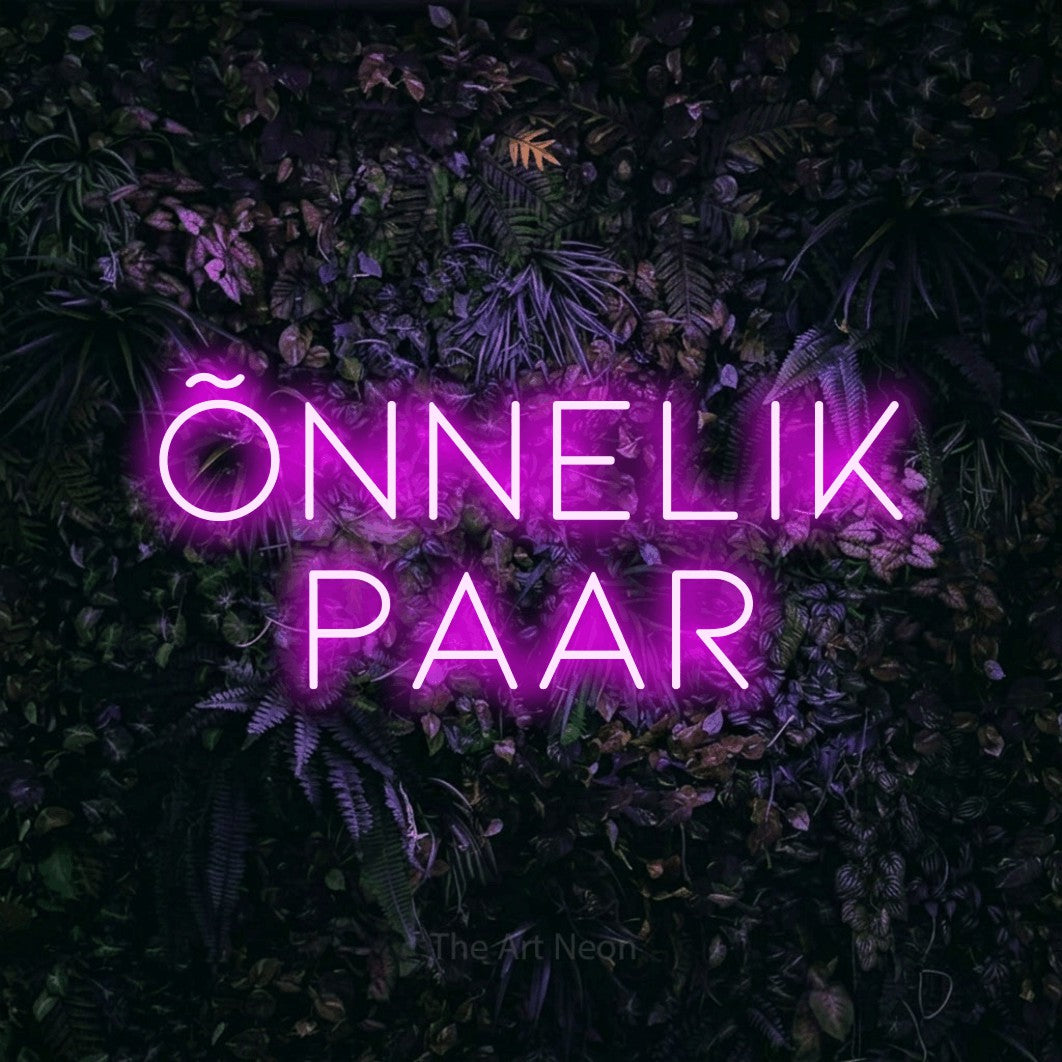 LED neon sign reading “ÕNNELIK PAAR”, arranged in 2 lines.