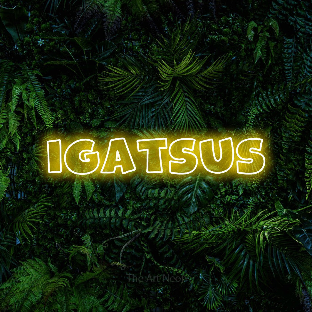 LED neon sign reading “igatsus”, arranged in a single line.