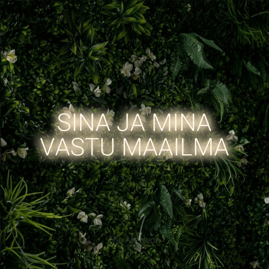 LED neon sign reading “SINA JA MINA VASTU MAAILMA”, arranged in 2 lines.