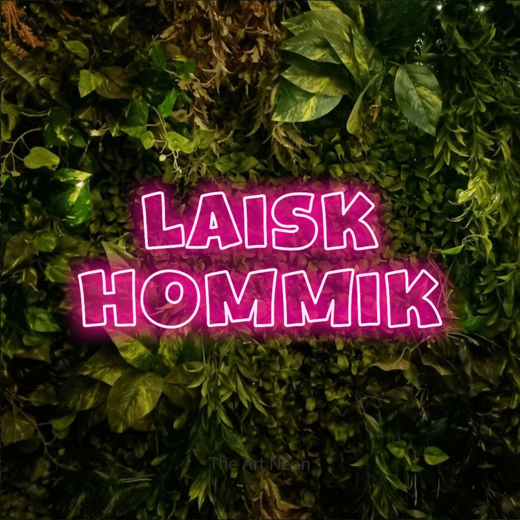 LED neon sign reading “LAISK HOMMIK”, arranged in 2 lines.