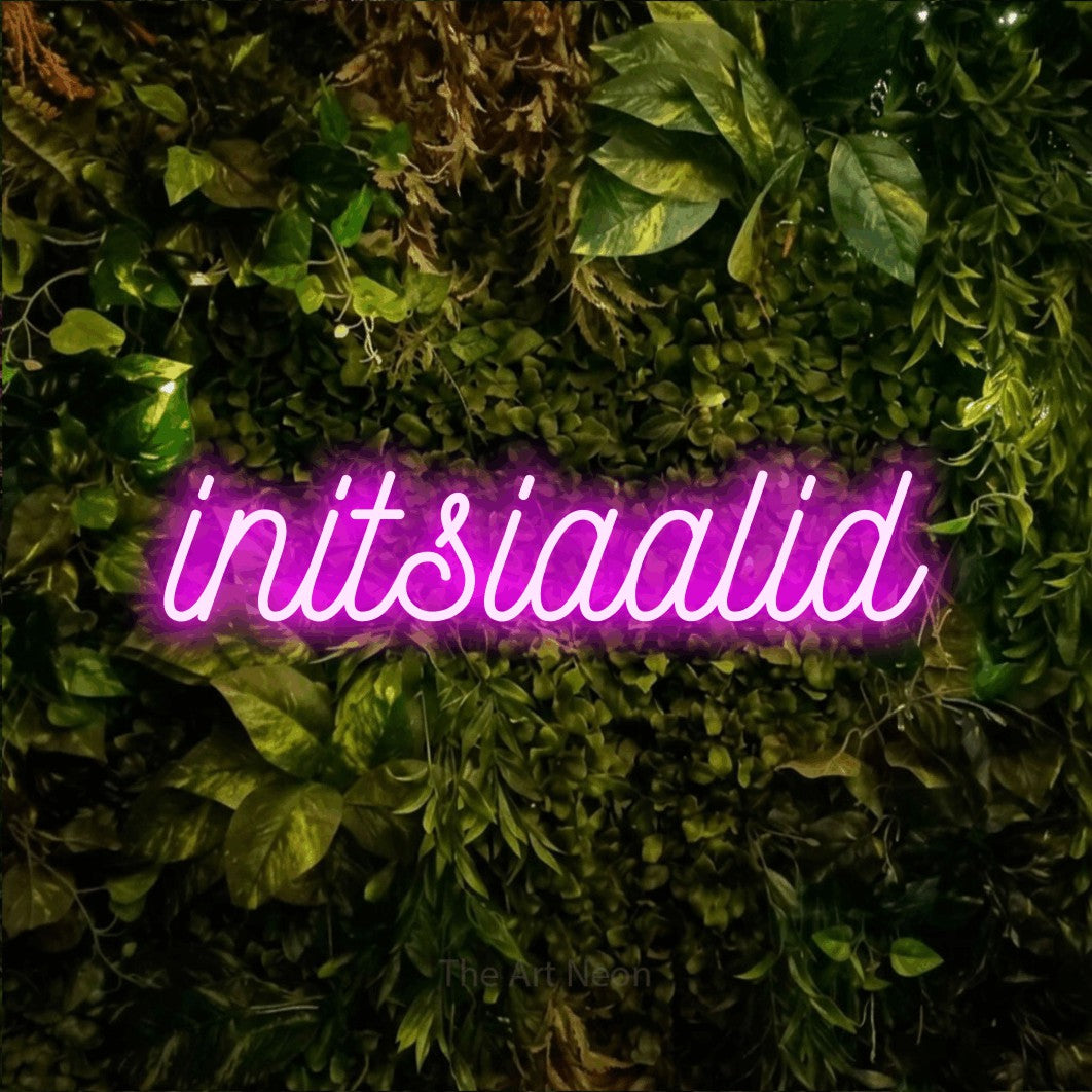 LED neon sign reading “initsiaalid”, arranged in a single line.